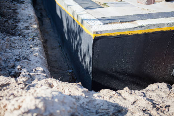 Professional Wet Basement Repair technician working in Huntington, VA